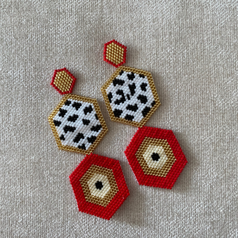 These earrings, handmade with Miyuki beads, are lightweight and comfortable to wear. They feature a bronze stud with gold plating