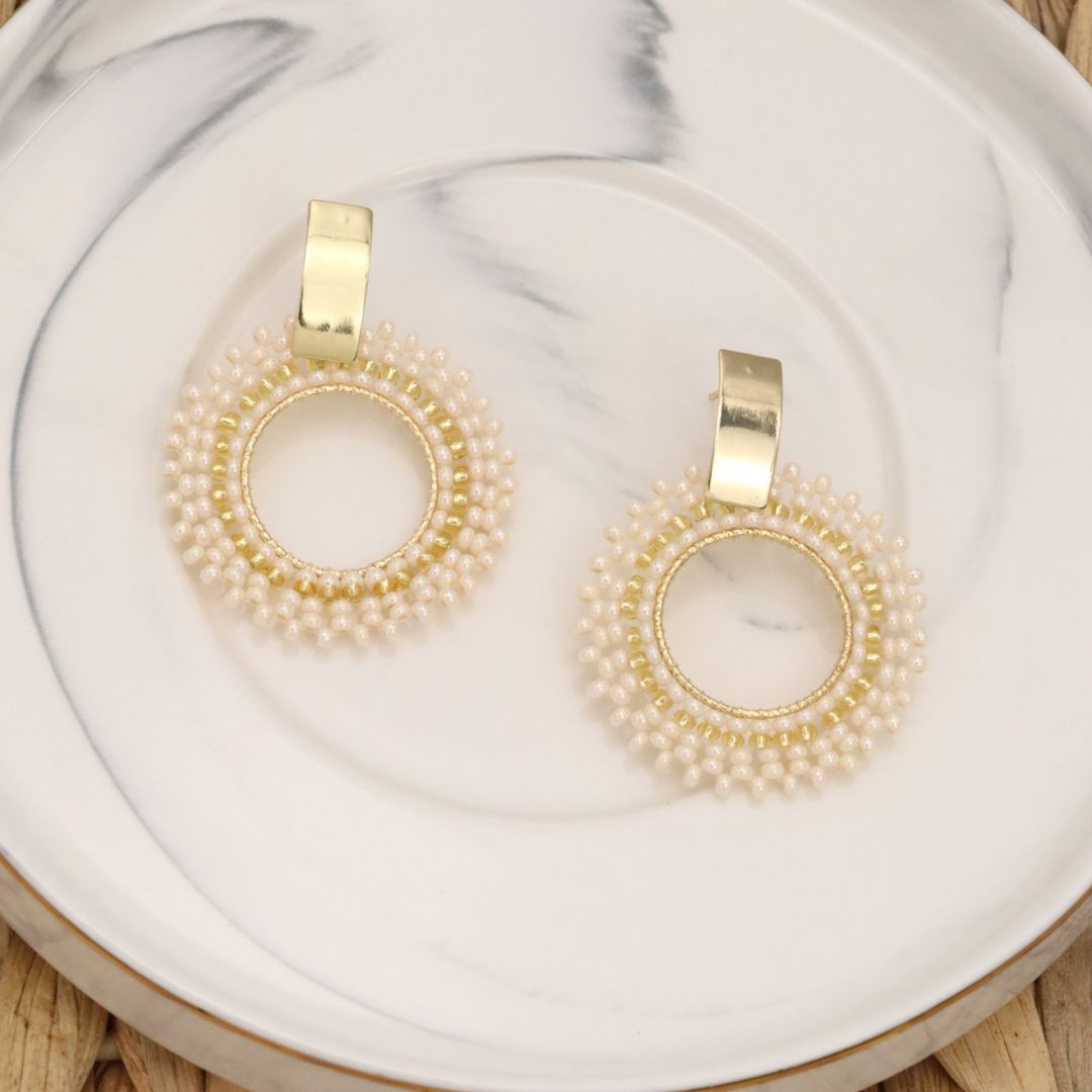 Handmade beaded earrings on wire, featuring a bronze stud with gold plating, available in various colors