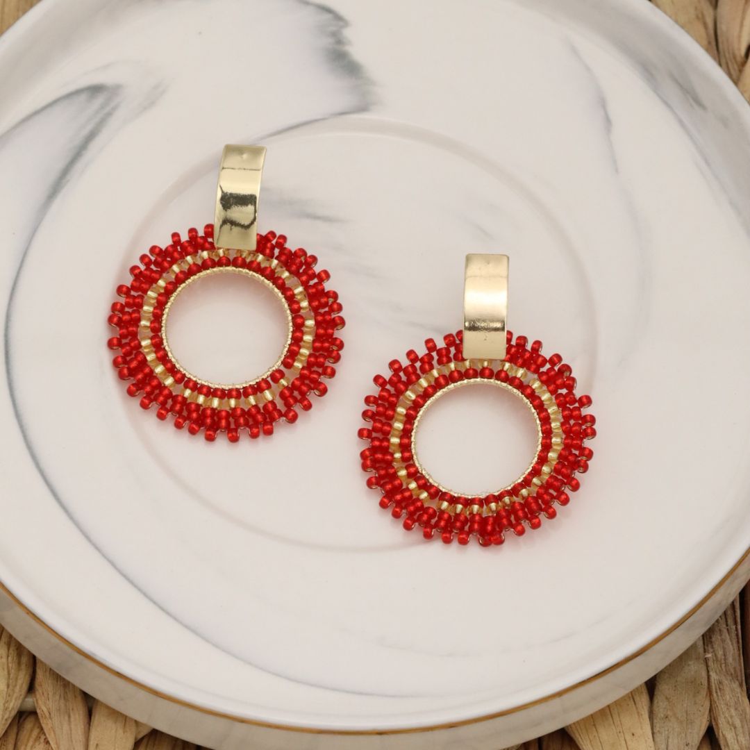 Handmade beaded earrings on wire, featuring a bronze stud with gold plating, available in various colors