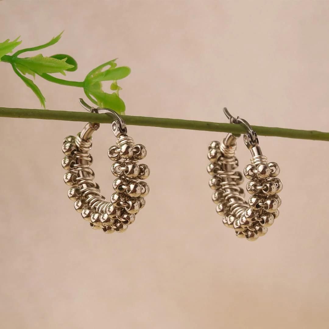 Handmade earrings with beads on wire, featuring a bronze stud with gold plating, available in various colors