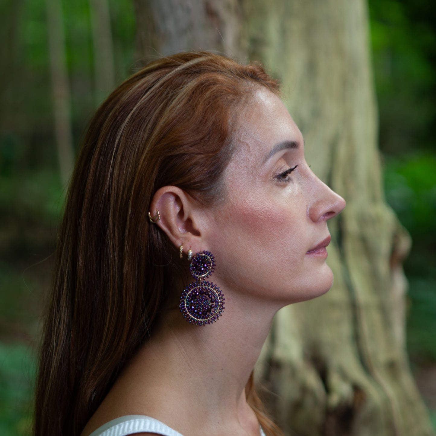 Handmade earrings with beads on wire, featuring a bronze stud with gold plating, available in various colors