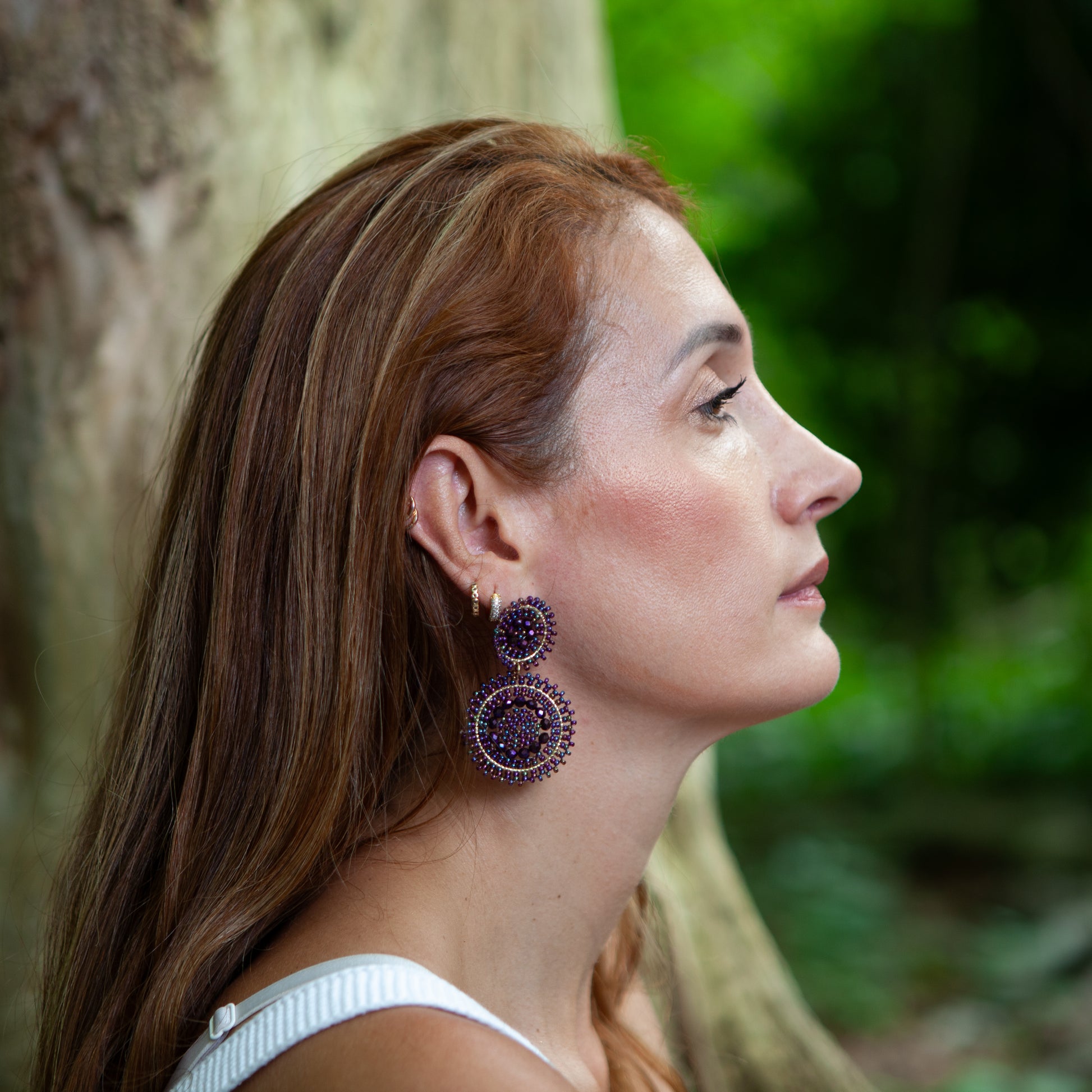 Handmade earrings with beads on wire, featuring a bronze stud with gold plating, available in various colors