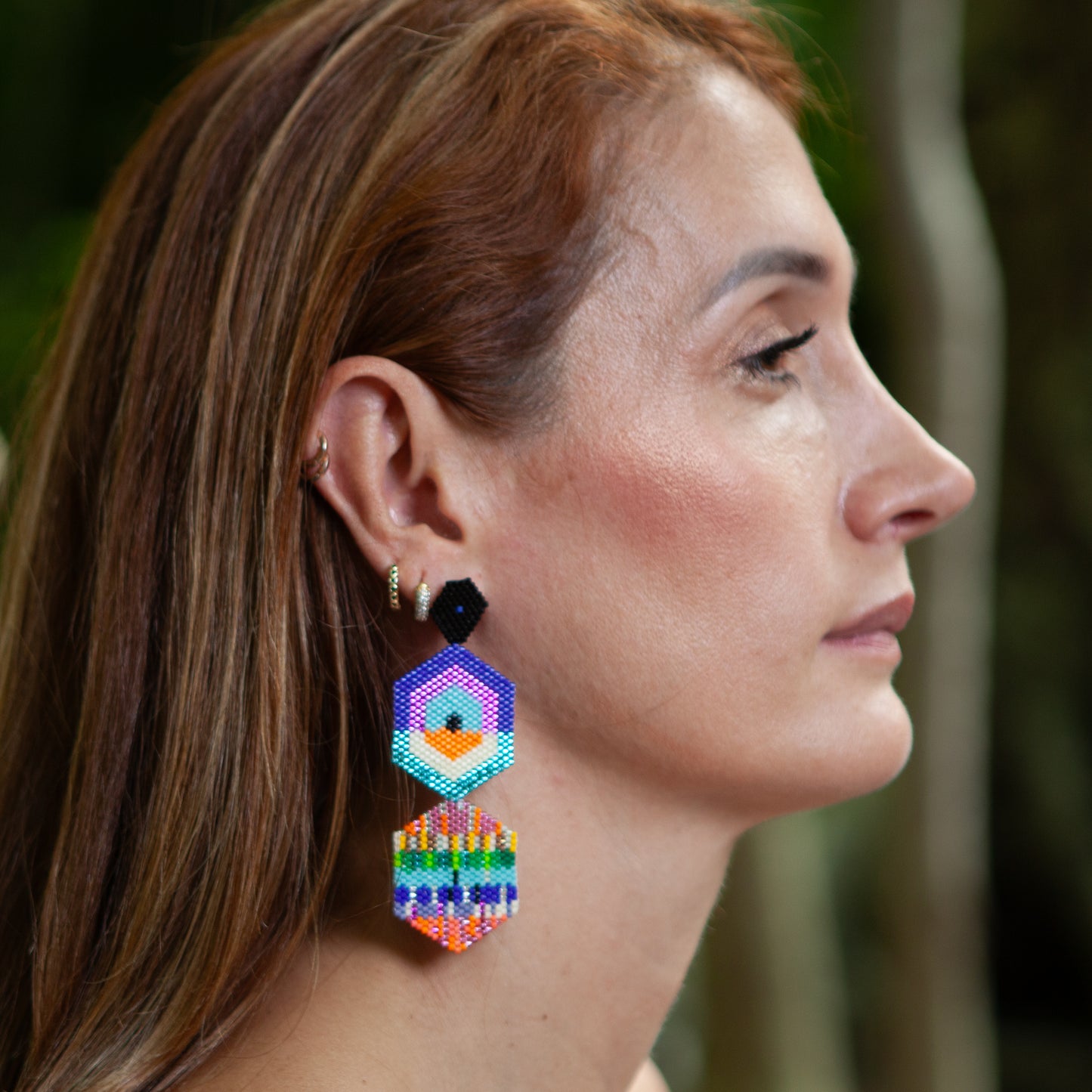 These earrings, handmade with Miyuki beads, are lightweight and comfortable to wear. They feature a bronze stud with gold plating