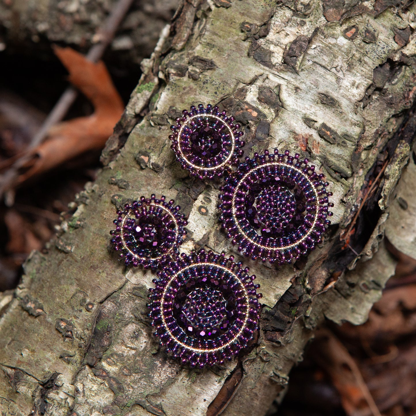 Handmade earrings with beads on wire, featuring a bronze stud with gold plating, available in various colors