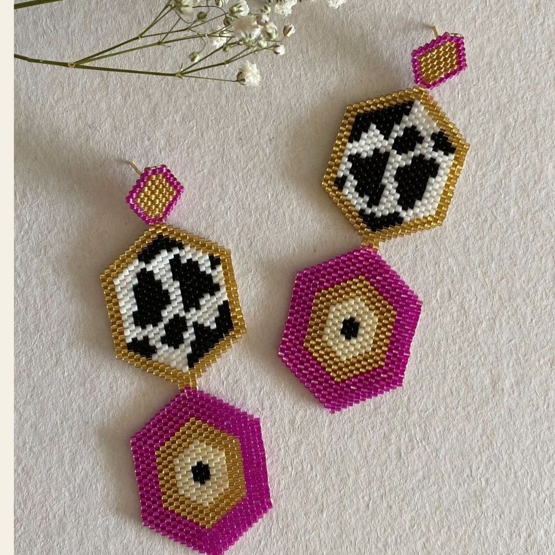 These earrings, handmade with Miyuki beads, are lightweight and comfortable to wear. They feature a bronze stud with gold plating