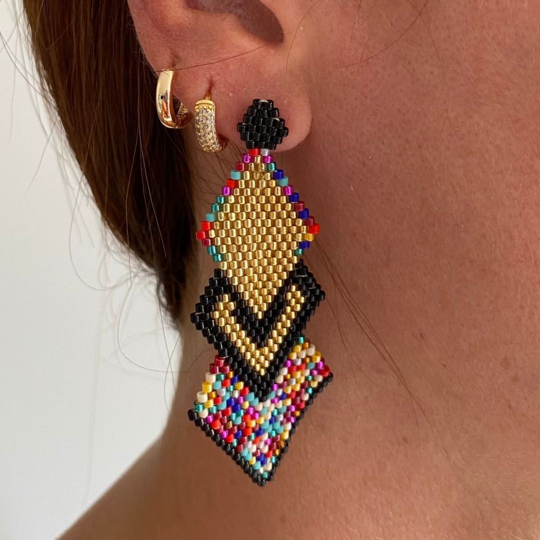 Elevate your style with our Triple Rhombus Earrings. Expertly handcrafted with intricate beadwork on fine wire, these earrings feature a stunning bronze stud with gold plating. Elevate your look and add a touch of luxury with our unique earrings, available in various colors to suit your personal taste.